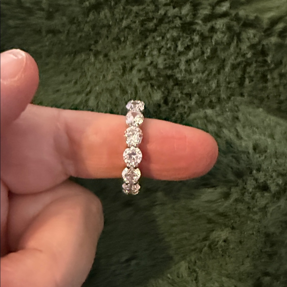 Joan Boyce Silver eternity round stone cubic zirconia Band.